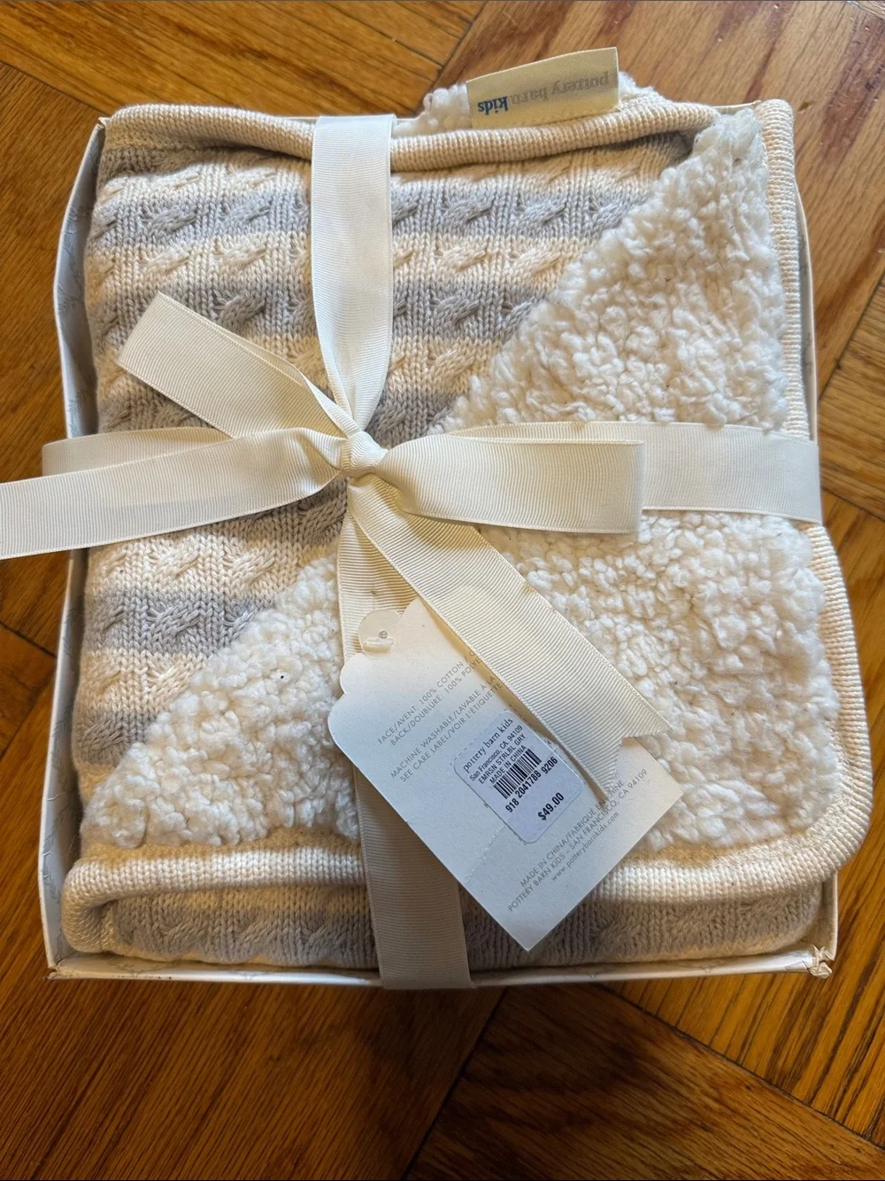 Brand new with tags! Pottery Barn Kids machine washable grey and white blanket